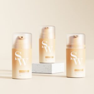 Three beige "SOMEWANG" PP bottles, including a 50ml airless type, are arranged on a light surface; one is elevated.