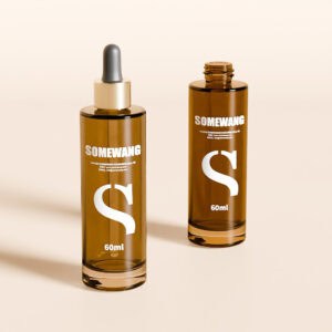 Two amber 'Somewang' bottles: a 60ml dropper and an open one, set against a beige backdrop, showcasing their versatility.