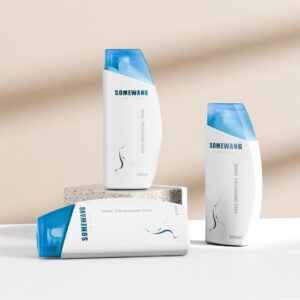Three white "SOMEWANG" 100ML HDPE Shampoo Bottles with blue flip-tops are displayed on a beige surface and textured block.