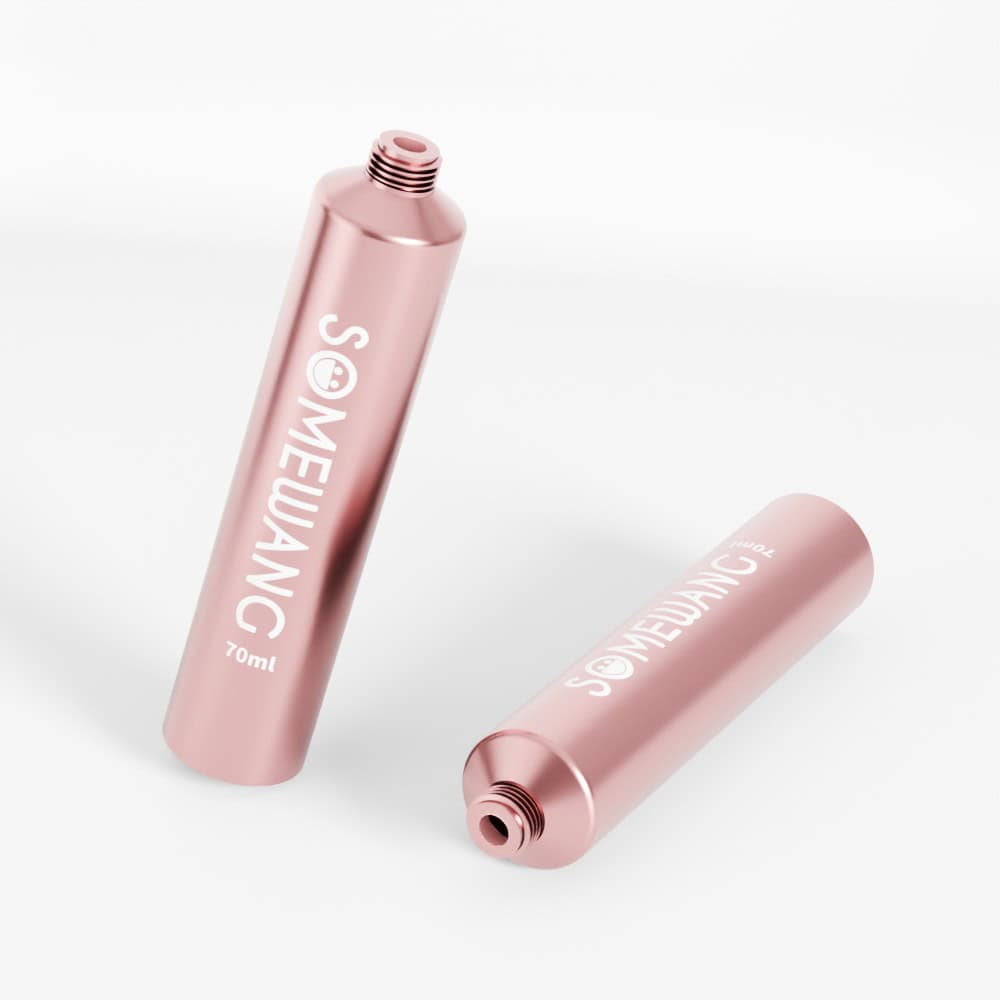 Two rose-colored Customized D30 70ml tubes with screw caps and "SOMEJANG" text, sleekly designed against a white background.
