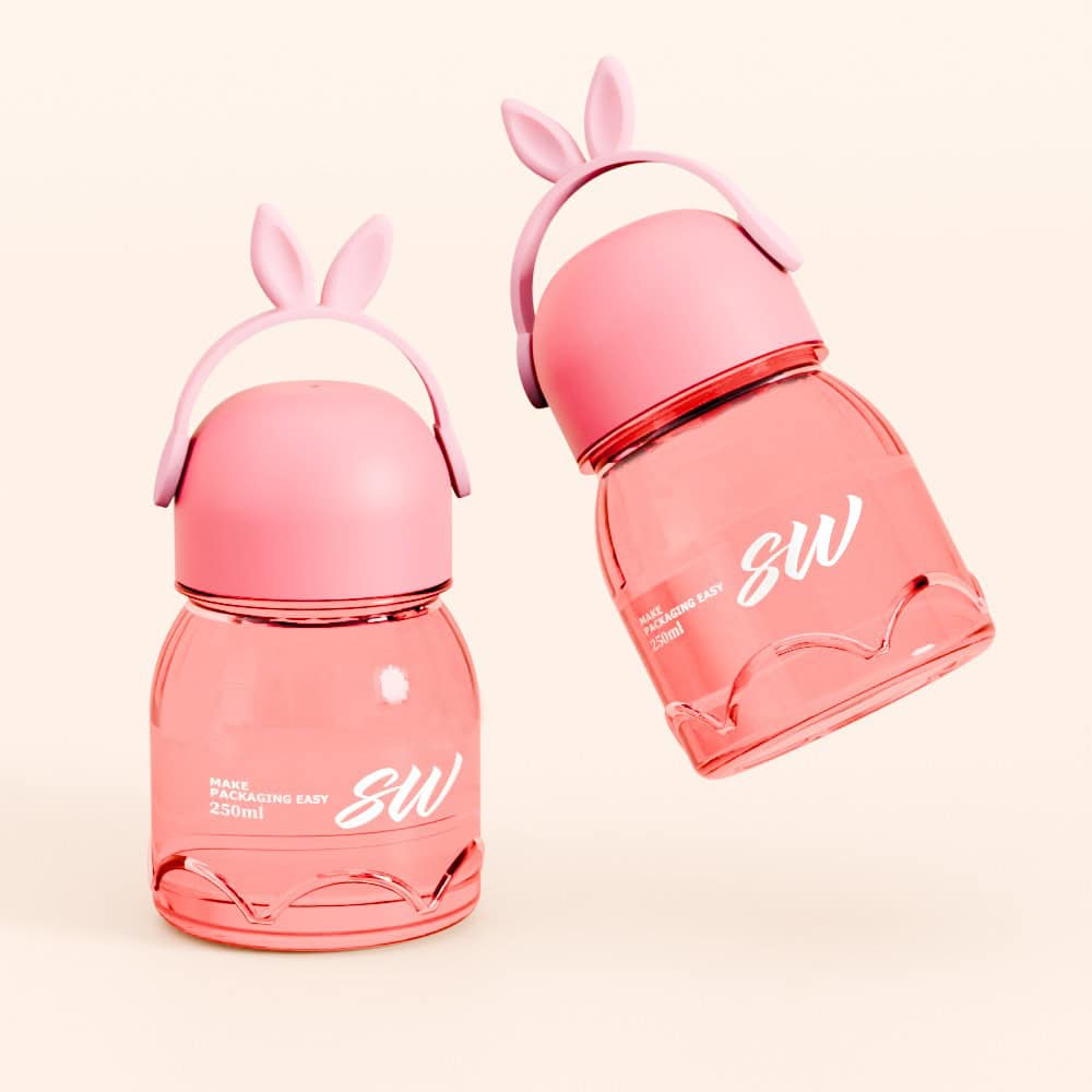 Two pink bottles with bunny ear handles labeled "SW" on a light background.