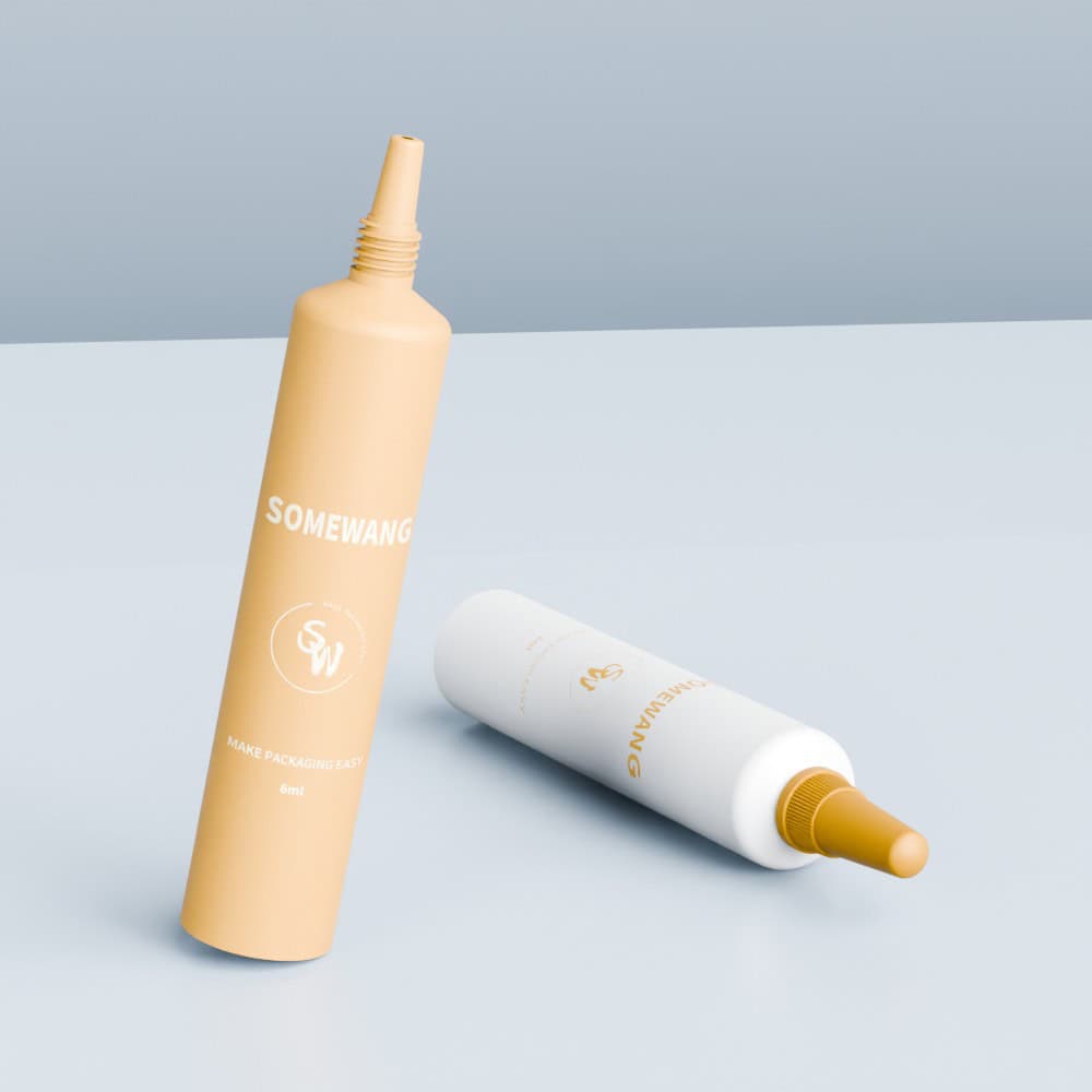 Two 6ml PE tubes—one beige upright, one white lying down—labeled "SOMEWANG" on a light surface.