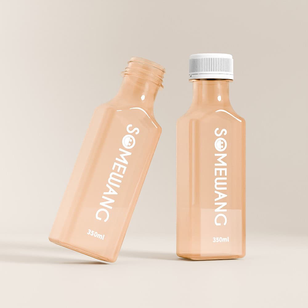 Two peach 350ml "SOMEWANG" PET bottles showcase the sleek design and theft-proof cap, one upright capped, the other open and tilted.