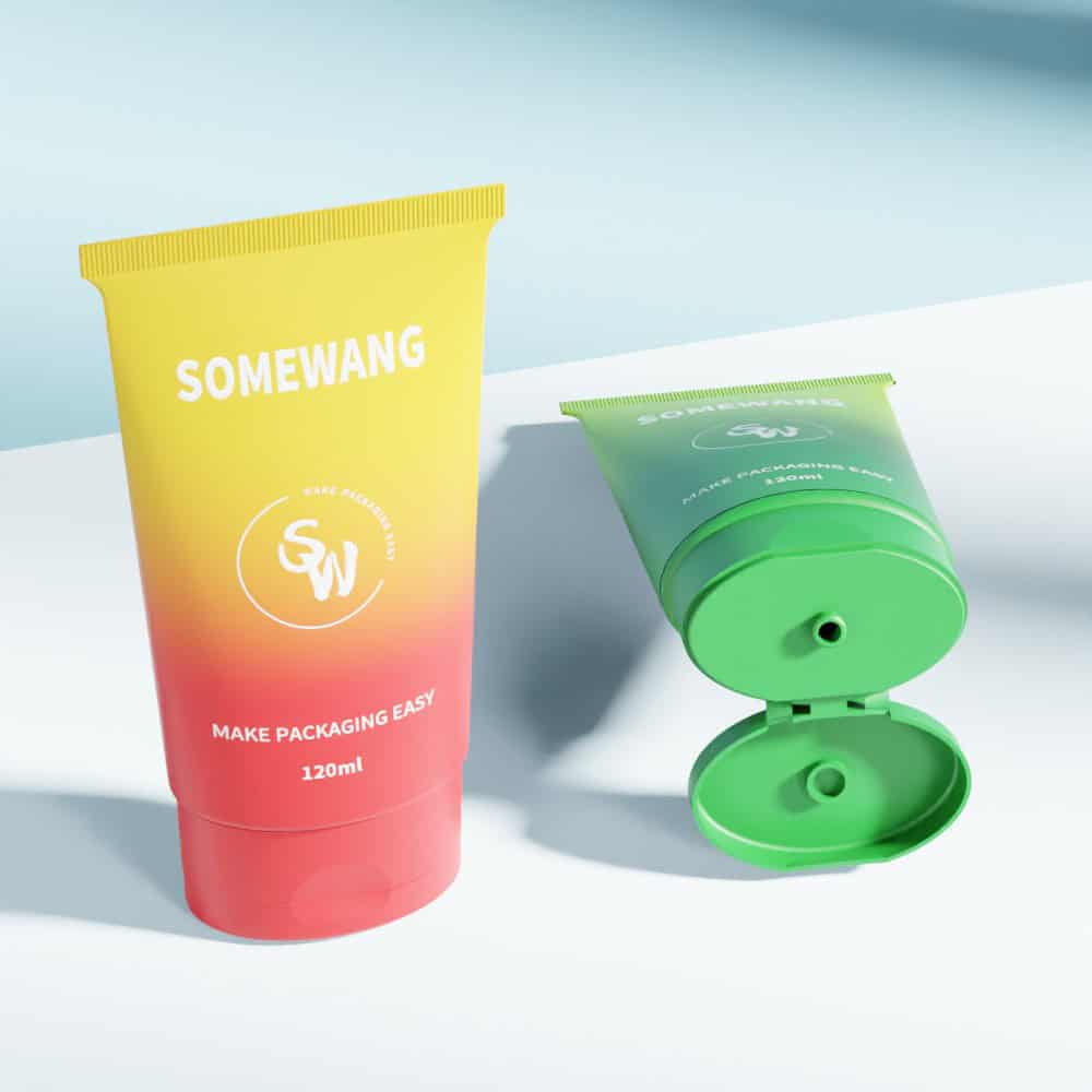 Two cosmetic tubes with "SOMEWANG" branding: one upright gradient tube, one green D45 120ml oval tube, cap open.
