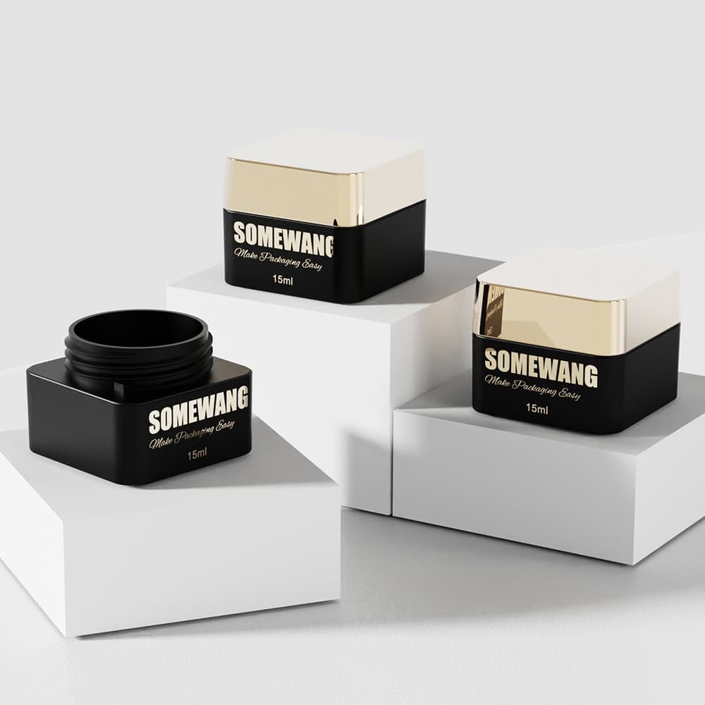 Three 50ml glass jars with screw caps rest on white blocks. One open jar shows its "SOMEWANG" label, fitting modern aesthetics.