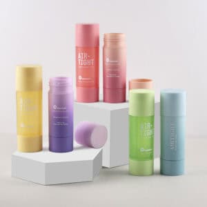 Five 40g PP deodorant tubes with caps off are displayed on white stands, showcasing their sleek, colorful design.